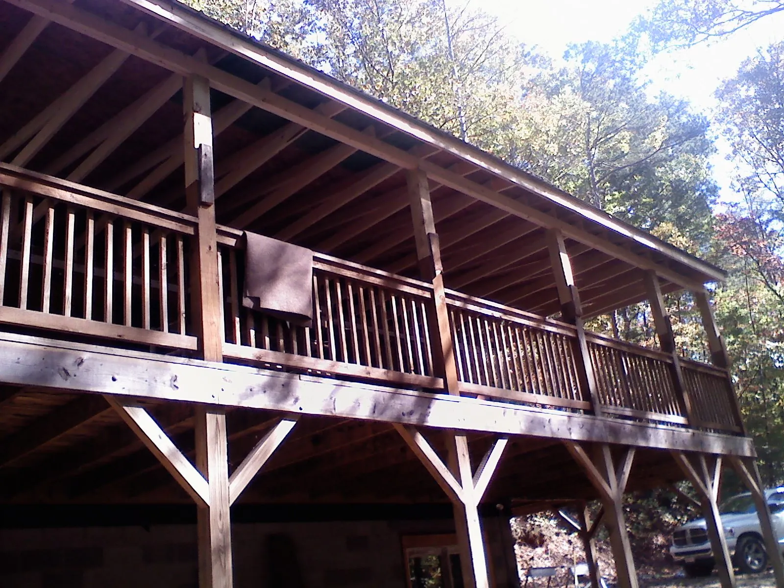 Timber framing under a new elevated porch and deck in Flushing